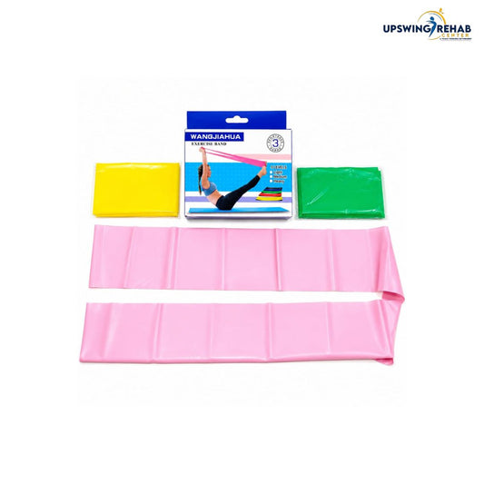 A pink resistance band shown partially extended, with two folded color options (yellow and green) and the retail packaging card above it, on a plain white background. The Upswing Rehab logo appears in the top right corner.