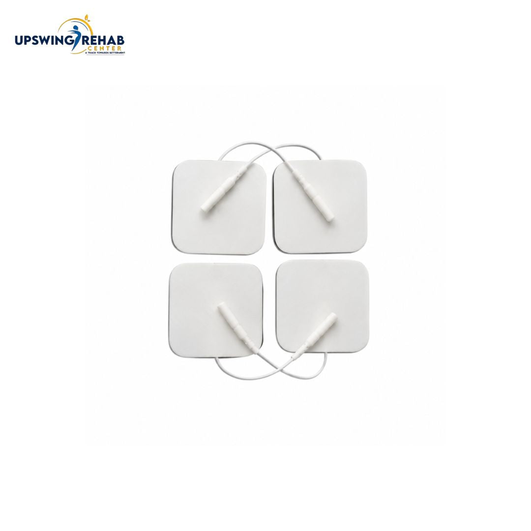 Four square white electrode pads arranged in a 2x2 grid with thin connecting wires, shown on a plain white background. The UPSWING REHAB logo appears in the top-left corner.