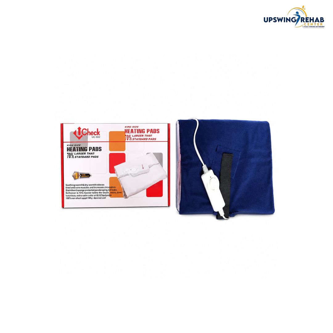 A blue heating pad next to its retail packaging box on a white background. The box is white with red and orange graphics and text.